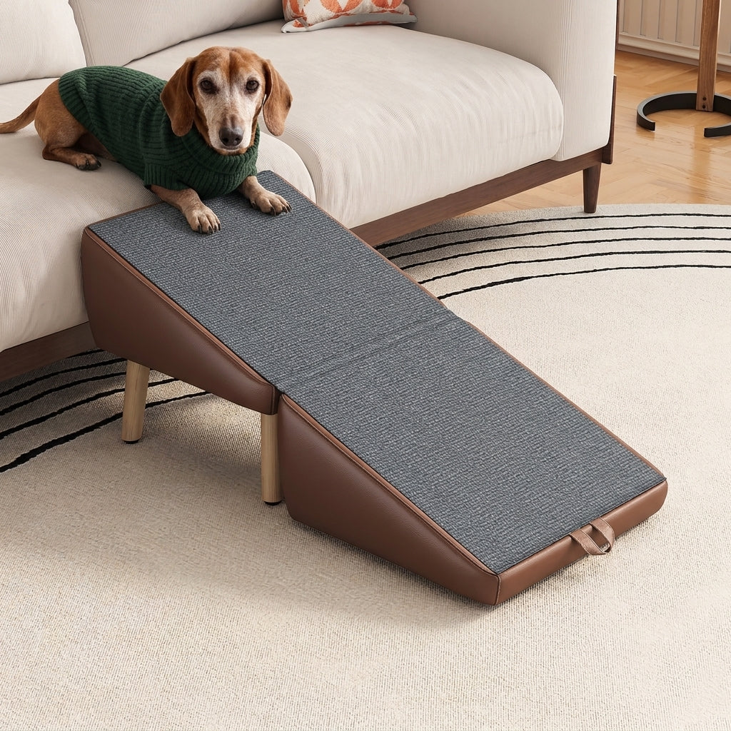 The ottoman ramp open against the couch, with Earl, our brand mascot, resting on the seat